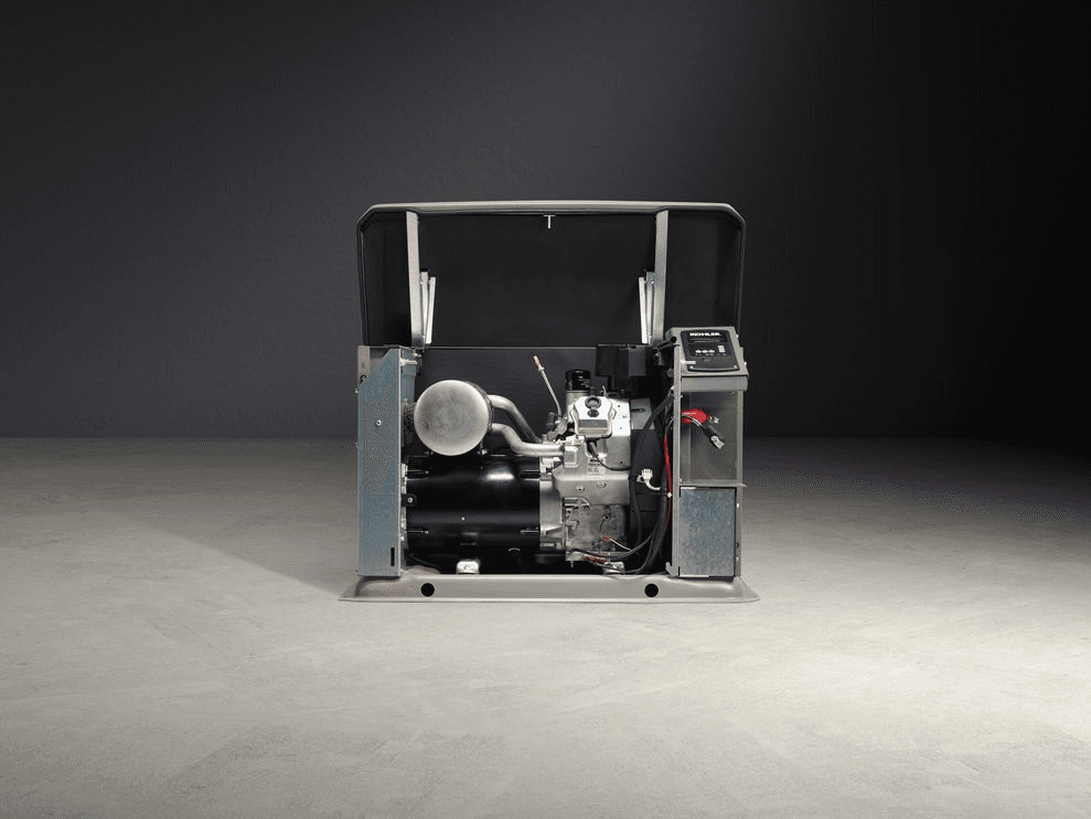 Image of a Kohler home generator without its exterior casing to reveal the powerful Kohler engine inside.